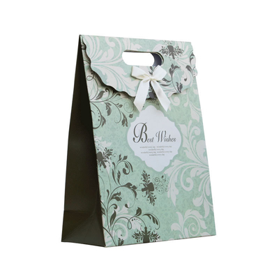 comprare Custom Wedding Gift Paper Bags with Die-Cut Handles & Ribbon – Luxury Party & Event Packaging online manufacture