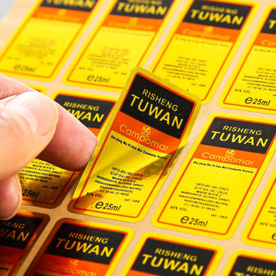 Un buon prezzo. Adesivi personalizzati con stampa in lamina d'oro, etichette metalliche in rilievo e adesivi metallici personalizzati in linea